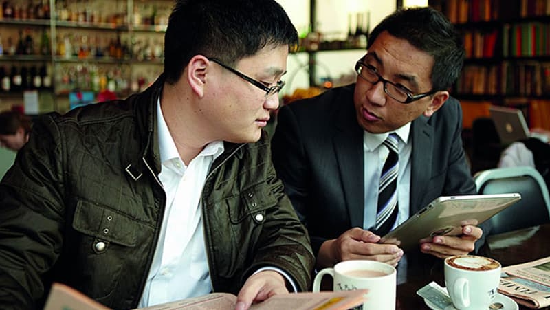 Image- Two Asian man in a cafe setting- 800px