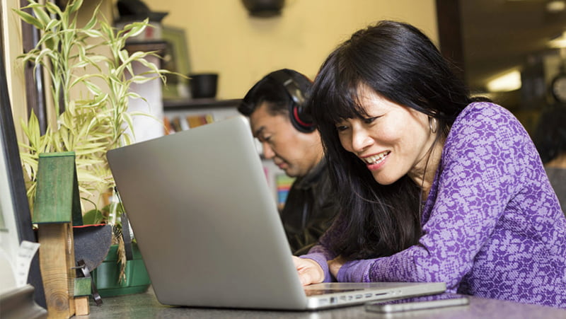 Image- Asian woman using a laptop 800px