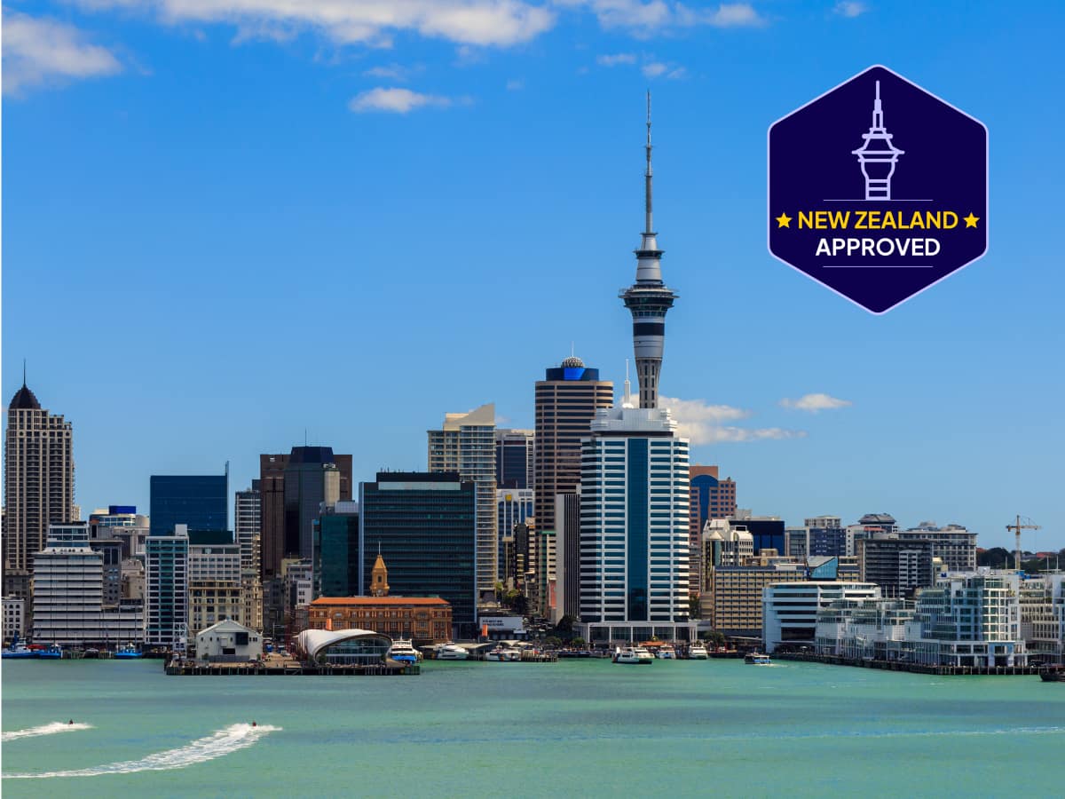 An image of the Auckland city skyline, New Zealand with an icon saying 'New Zealand approved'