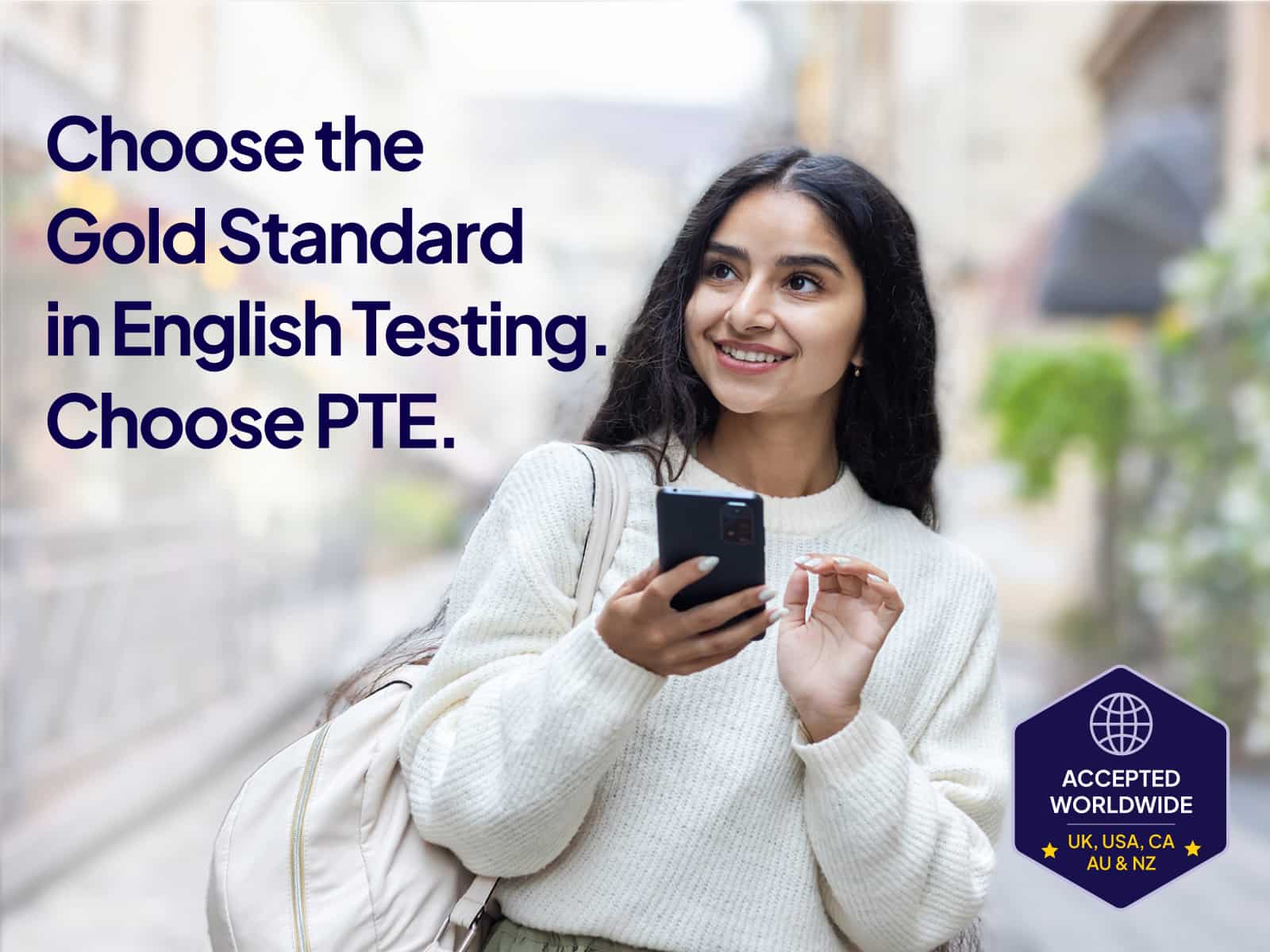 Picture of a woman with a mobile phone, overlaid with the words 'Choose the Gold Standard in English Testing. Choose PTE.'